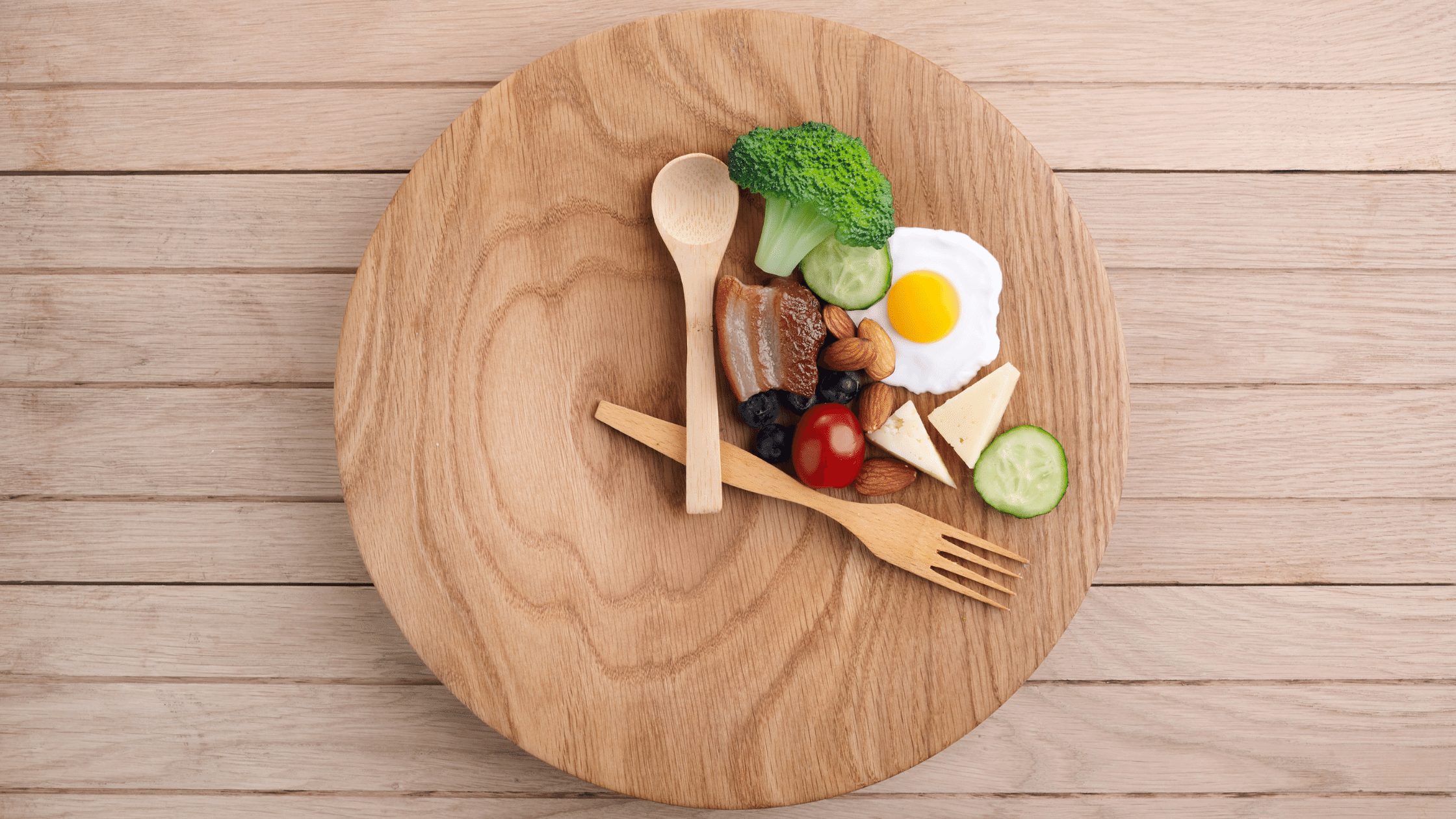 Symbolizing intermittent fasting with food displayed on plate as a clock